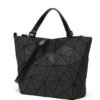 Geometric Luminous Purse And Handbag | VaquitaRepublic